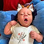 baby, infant, yawning, plush_toy, blue_plush, red_blanket, white_shirt, pink_pants, digital_filter, fox_ears, cute, sleepy, indoors, child, portrait, clothing, soft_toy, relaxed, person, resting