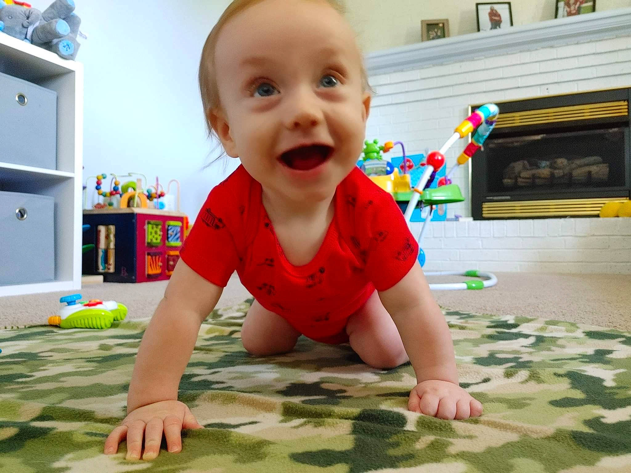 Sean joined the competition — help win amazing prizes! baby, baby_playing_with_toys, baby_toddler_clothing, cheek, child, crawling, floor, flooring, fun, happy, head, leisure, person, play, product, room, sitting, smile, standing, toddler