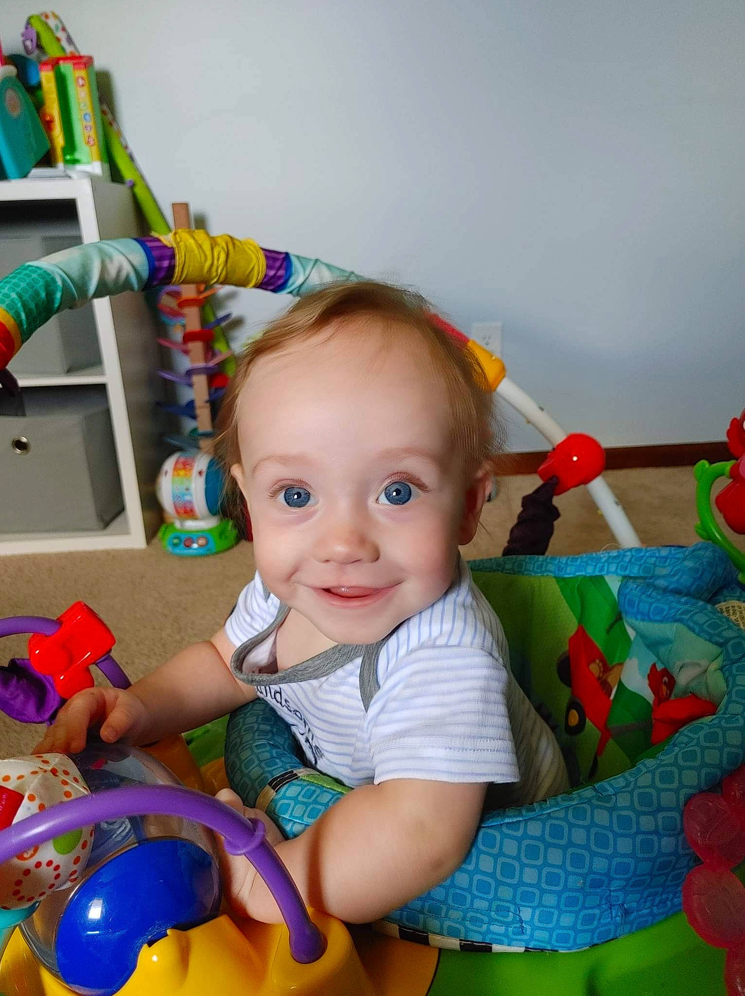 Sean is registered to the contest to win money with this photo: baby, baby_playing_with_toys, baby_products, baby_toddler_clothing, baby_toys, child, eye, fun, happy, joy, person, photograph, play, product, room, sitting, smile, snapshot, textile, toddler