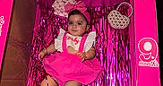 Leylani is registered to the contest to win money with this photo: accessories, baby, birthday, box, bracelet, celebration, child, cute, decoration, girl, headband, indoors, infant, party, pink, portrait, ribbon, shoes, smile, toddler