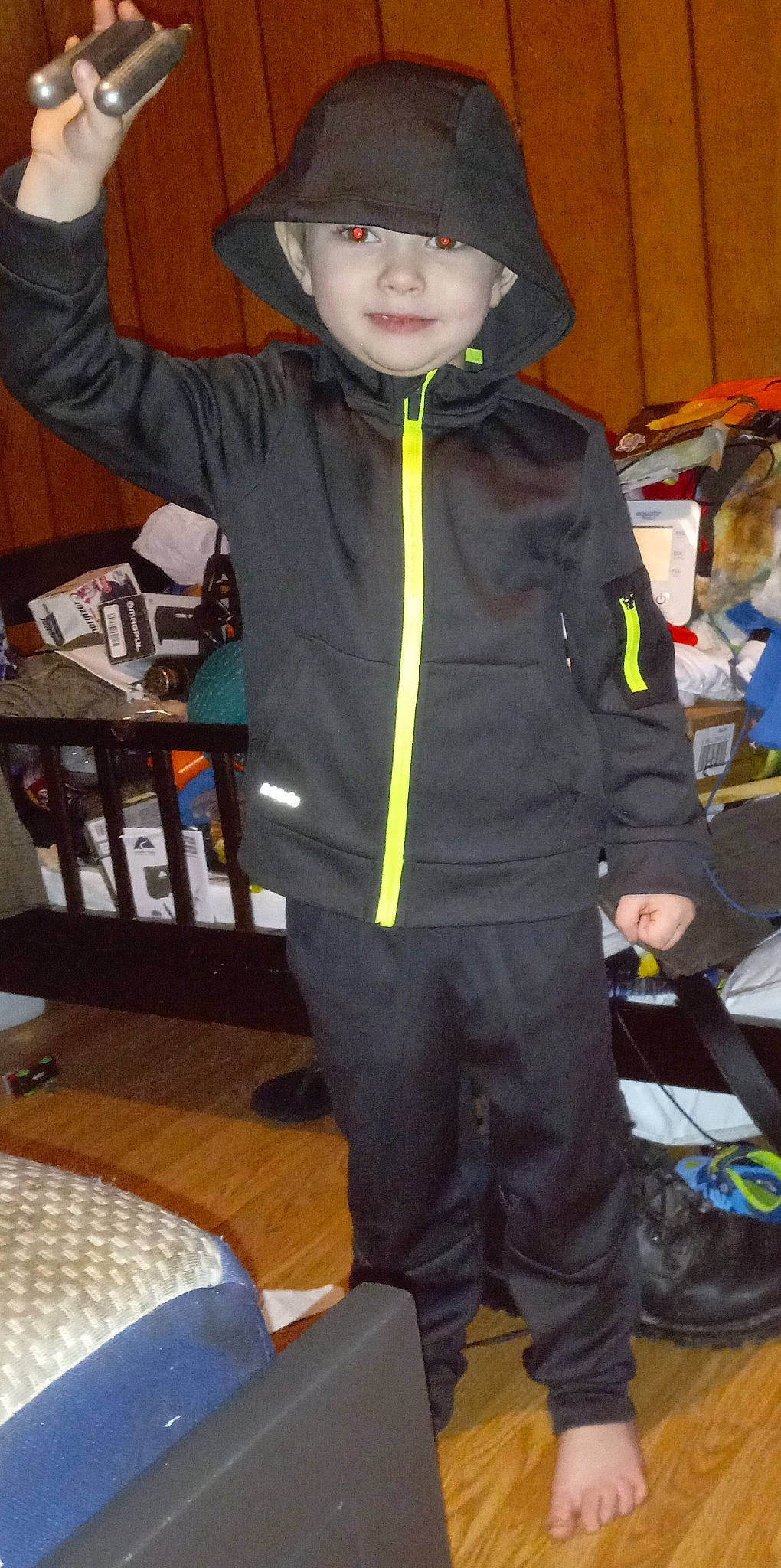 Colt is registered to the contest to win money with this photo: child, costume, costume_hat, fashion_accessory, fictional_character, fun, glove, headwear, helmet, hoodie, joy, person, personal_protective_equipment, room, sleeve, toddler, trick_or_treat, uniform, windbreaker, workwear