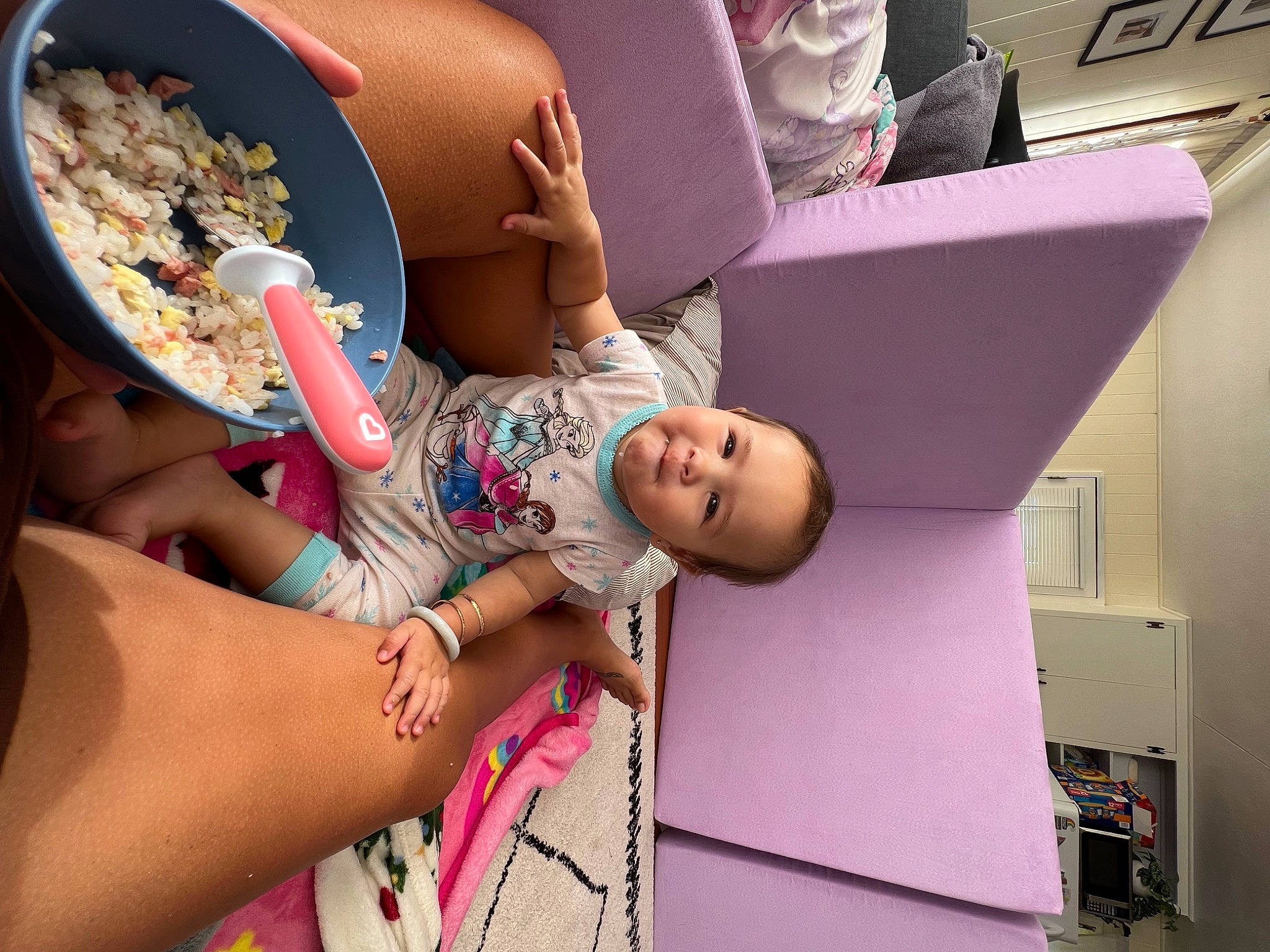 Alaya is registered to the contest to win money with this photo: abdomen, child, comfort, eyewear, finger, fun, happy, human_leg, jewellery, knee, leisure, magenta, nail, person, pink, room, sitting, skin, thigh, toddler