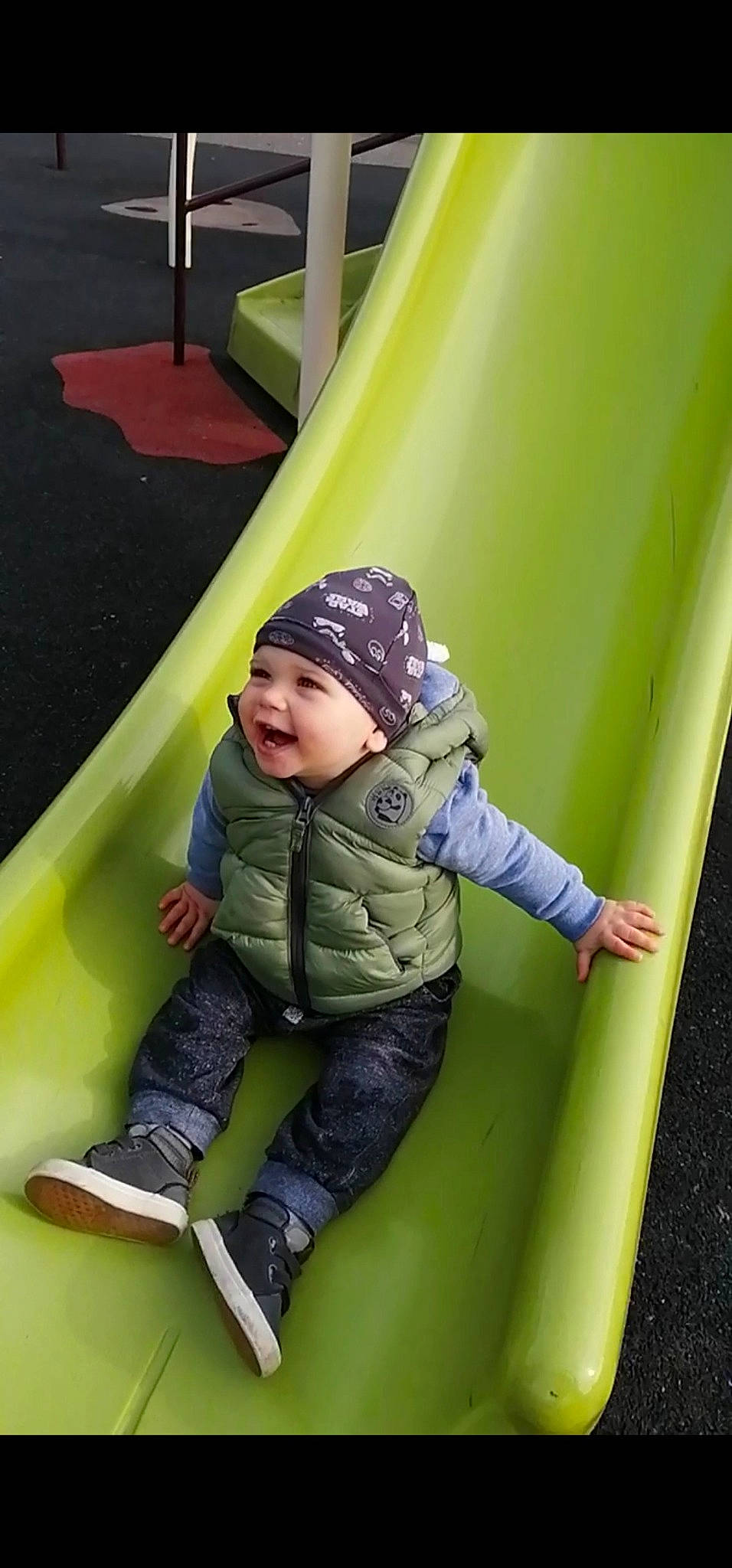 Filip joined the competition — help win amazing prizes! baby, baby_toddler_clothing, cap, child, chute, comfort, eye, fun, grass, green, headwear, human_body, jacket, leisure, outdoor_play_equipment, person, playground, playground_slide, recreation, sleeve