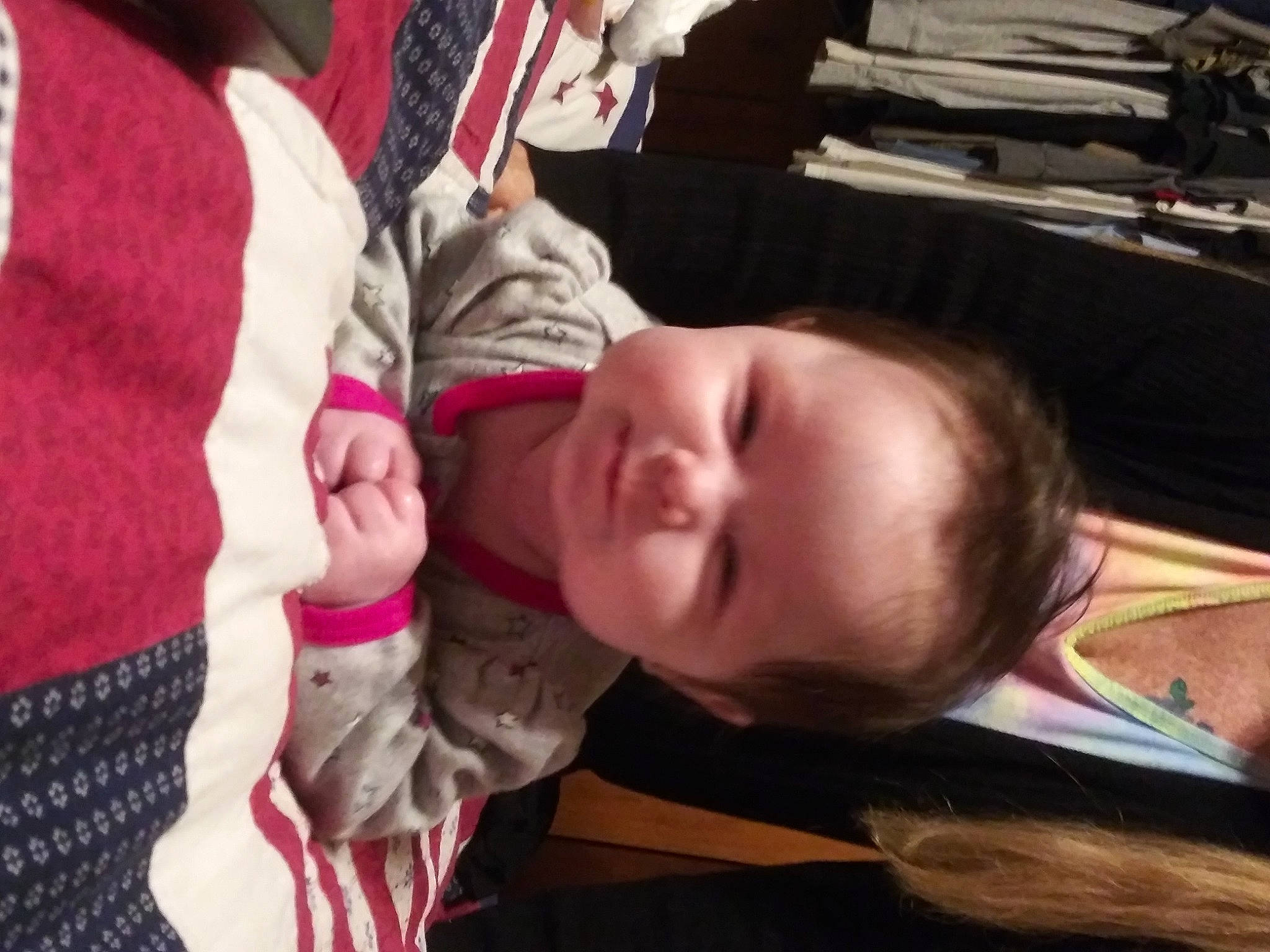 Emery is registered to the contest to win money with this photo: baby, baby_toddler_clothing, carmine, cheek, child, comfort, ear, eyelash, finger, fun, happy, mouth, nail, nose, person, room, sitting, skin, smile, thumb