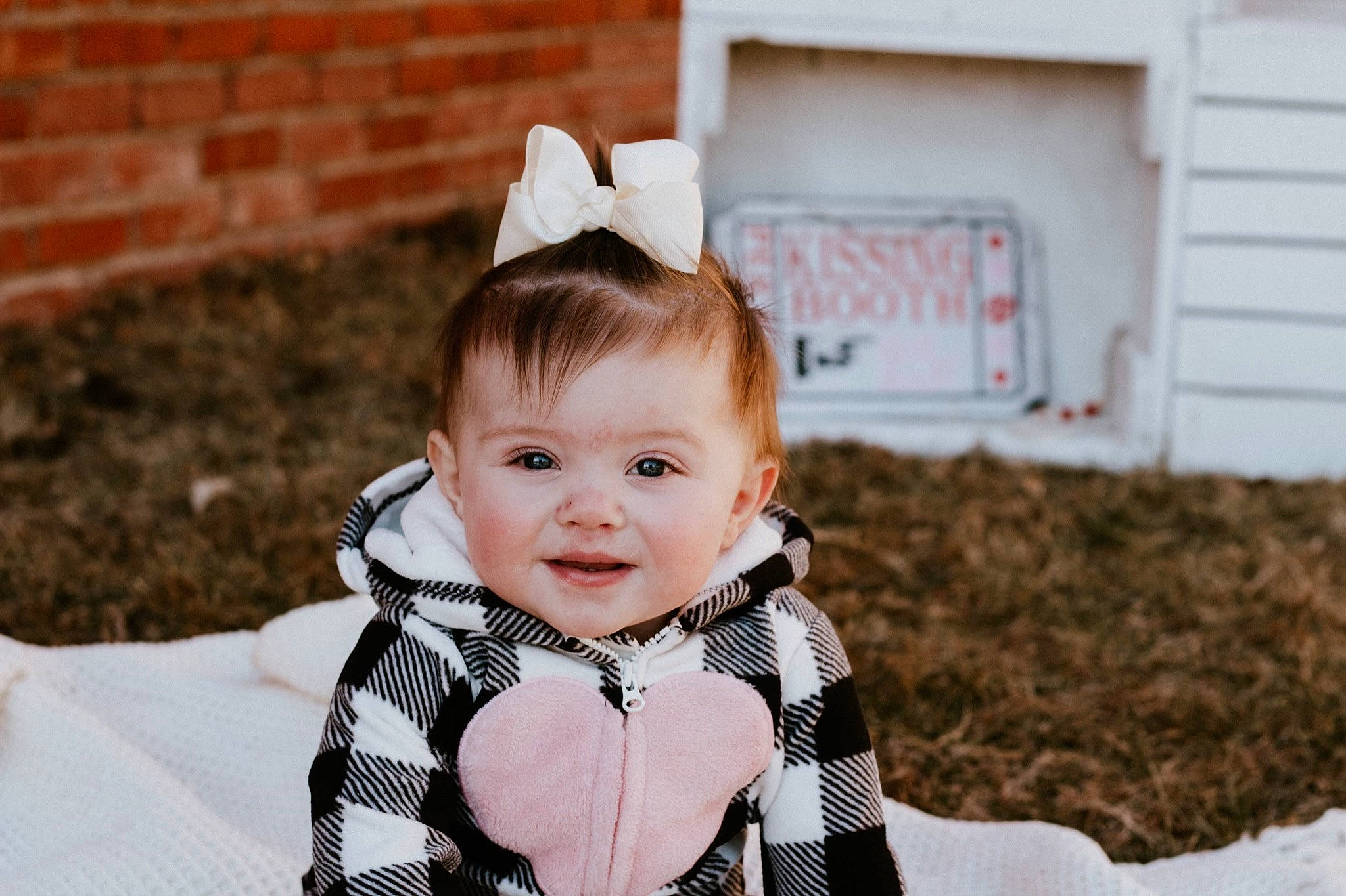 Dani joined the competition — help win amazing prizes! baby, baby_toddler_clothing, collar, costume_hat, dress, event, eye, flash_photography, grass, hairstyle, happy, head, iris, joy, pattern, person, sitting, sleeve, smile, toddler