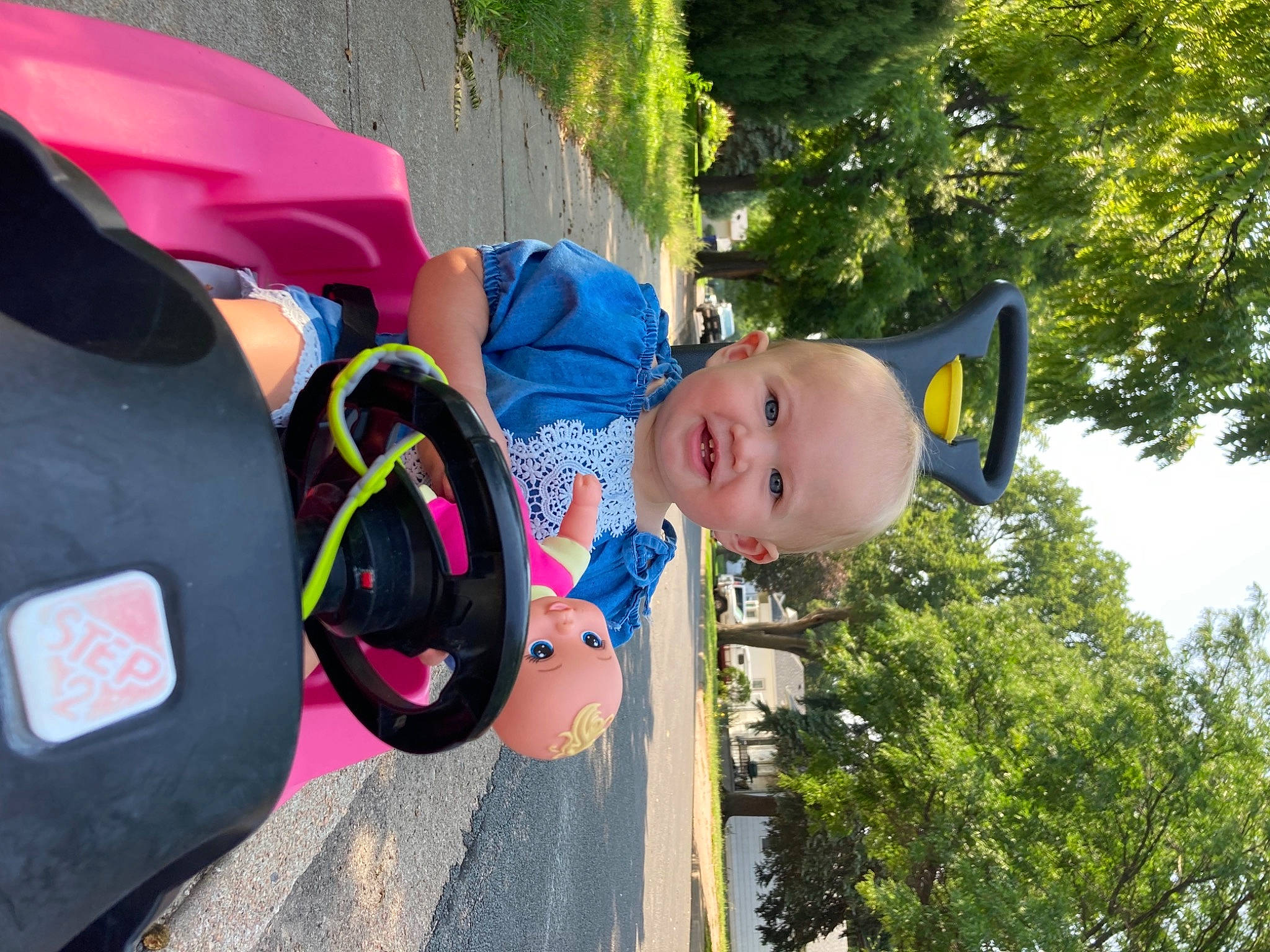 Claire is registered to the contest to win money with this photo: baby, baby_toddler_clothing, child, fun, grass, happy, hat, joy, leaf, leisure, magenta, person, pink, plant, public_space, purple, recreation, smile, spring, toddler