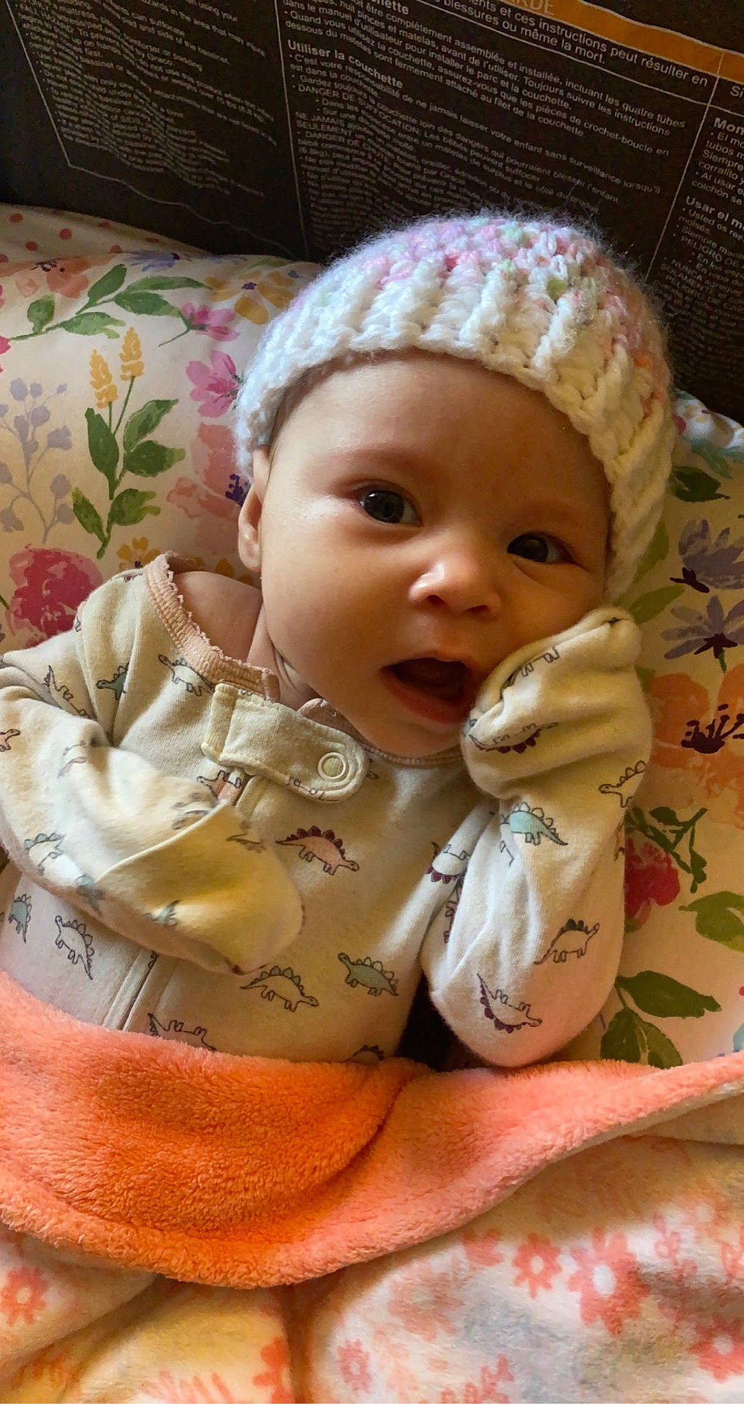 Elodie joined the competition — help win amazing prizes! baby, baby_toddler_clothing, cap, cheek, child, comfort, dress, face, headwear, iris, knit_cap, linens, lip, nose, pattern, person, product, sitting, skin, sleeve