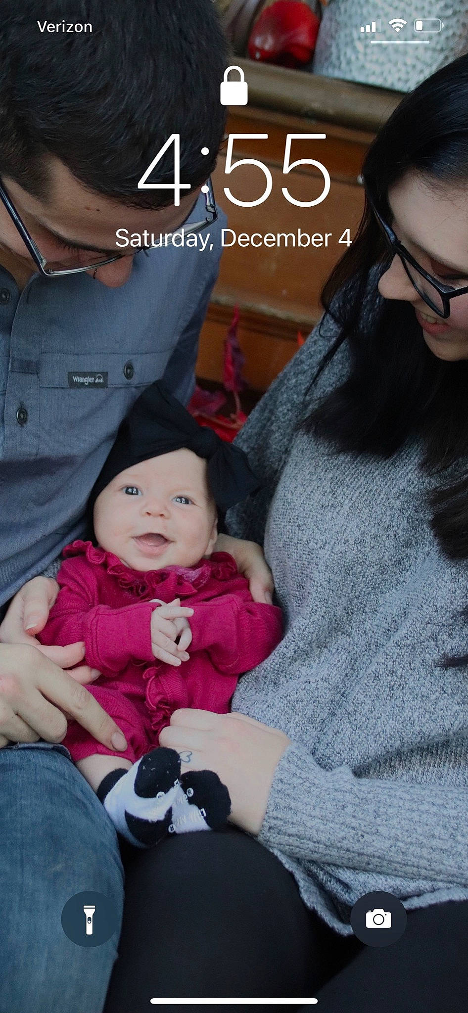 Elodie is registered to the contest to win money with this photo: baby, baby_toddler_clothing, black, cheek, child, eyelash, eyewear, finger, gesture, happy, head, headwear, interaction, lap, outerwear, person, product, skin, sleeve, textile