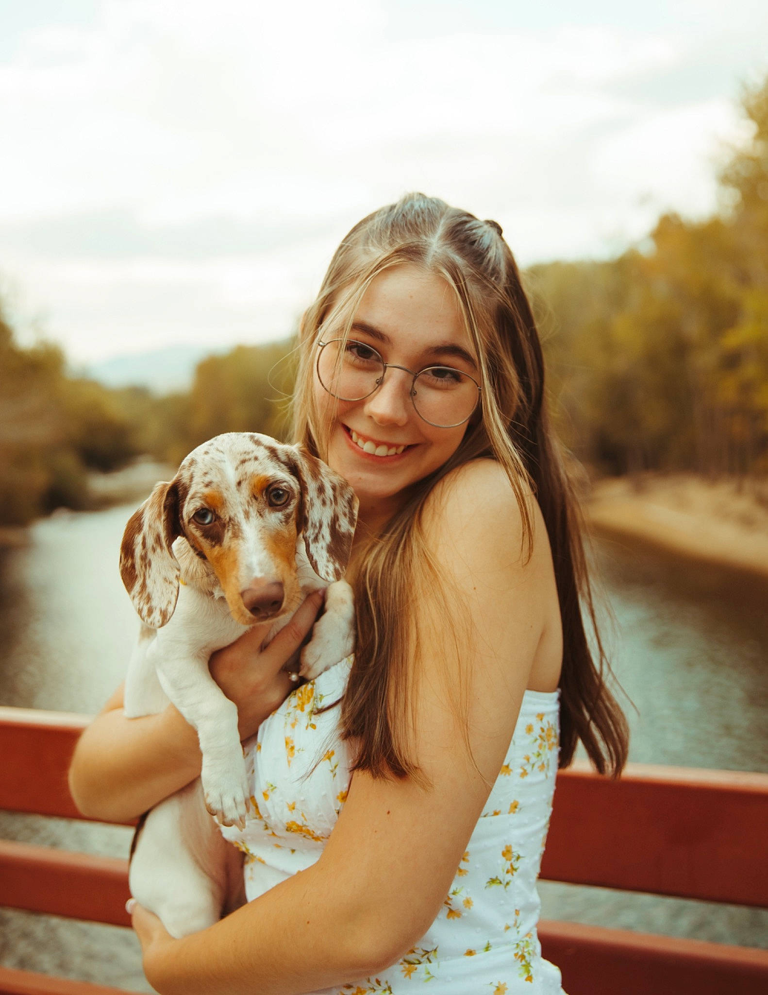 Millie is registered to the contest to win money with this photo: beauty, carnivore, companion_dog, dog, dog_breed, fawn, flash_photography, friendship, gesture, grass, hair, happy, leisure, long_hair, people_in_nature, skin, sky, smile, tree, water