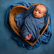 Jaxson joined the competition — help win amazing prizes! baby, blue_background, blue_blanket, child, cozy, cute, heart_shaped_bowl, infant, newborn, newborn_photography, peaceful, portrait, sleeping, small, soft_lighting, studio_photo, swaddled, tiny_feet, wooden_bowl, wrapped