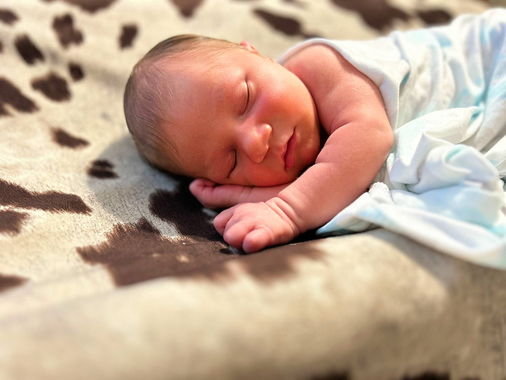 Calvin is registered to the contest to win money with this photo: baby, baby_toddler_clothing, bedtime, cheek, child, chin, comfort, eye, eyebrow, face, flooring, happy, head, linens, nose, pattern, person, portrait_photography, sleep, toddler