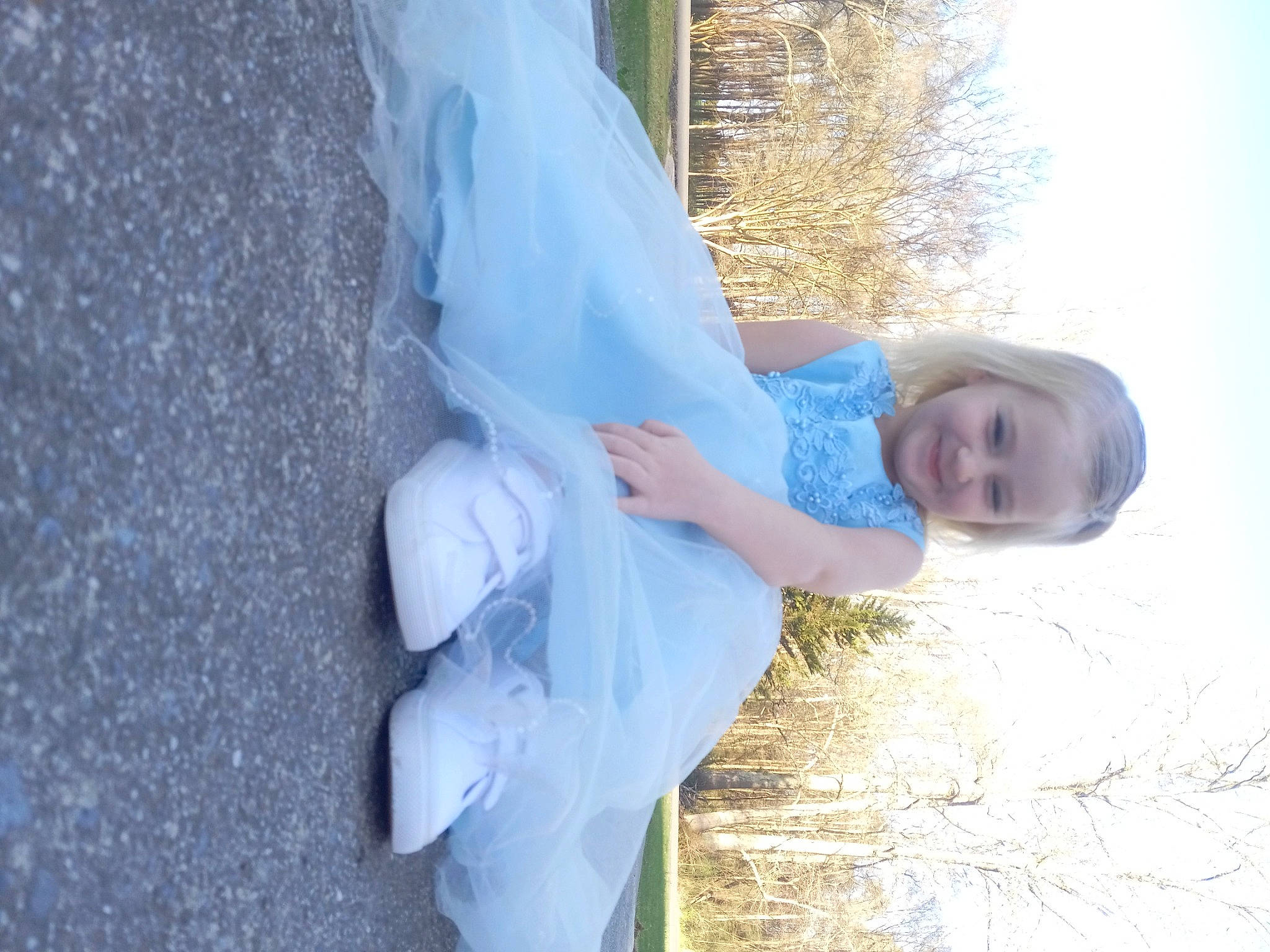 Emma joined the competition — help win amazing prizes! azure, dress, electric_blue, freezing, fun, gesture, grass, hand, happy, joy, leisure, people_in_nature, person, sky, smile, toddler, tree, water, winter, wood