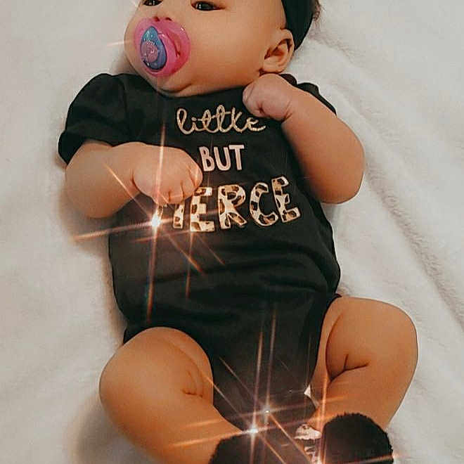 Khaliyah joined the competition — help win amazing prizes! arm, baby, black_hair, cheek, child, doll, head, joint, leg, pink, sleeve, t_shirt, toddler, toy