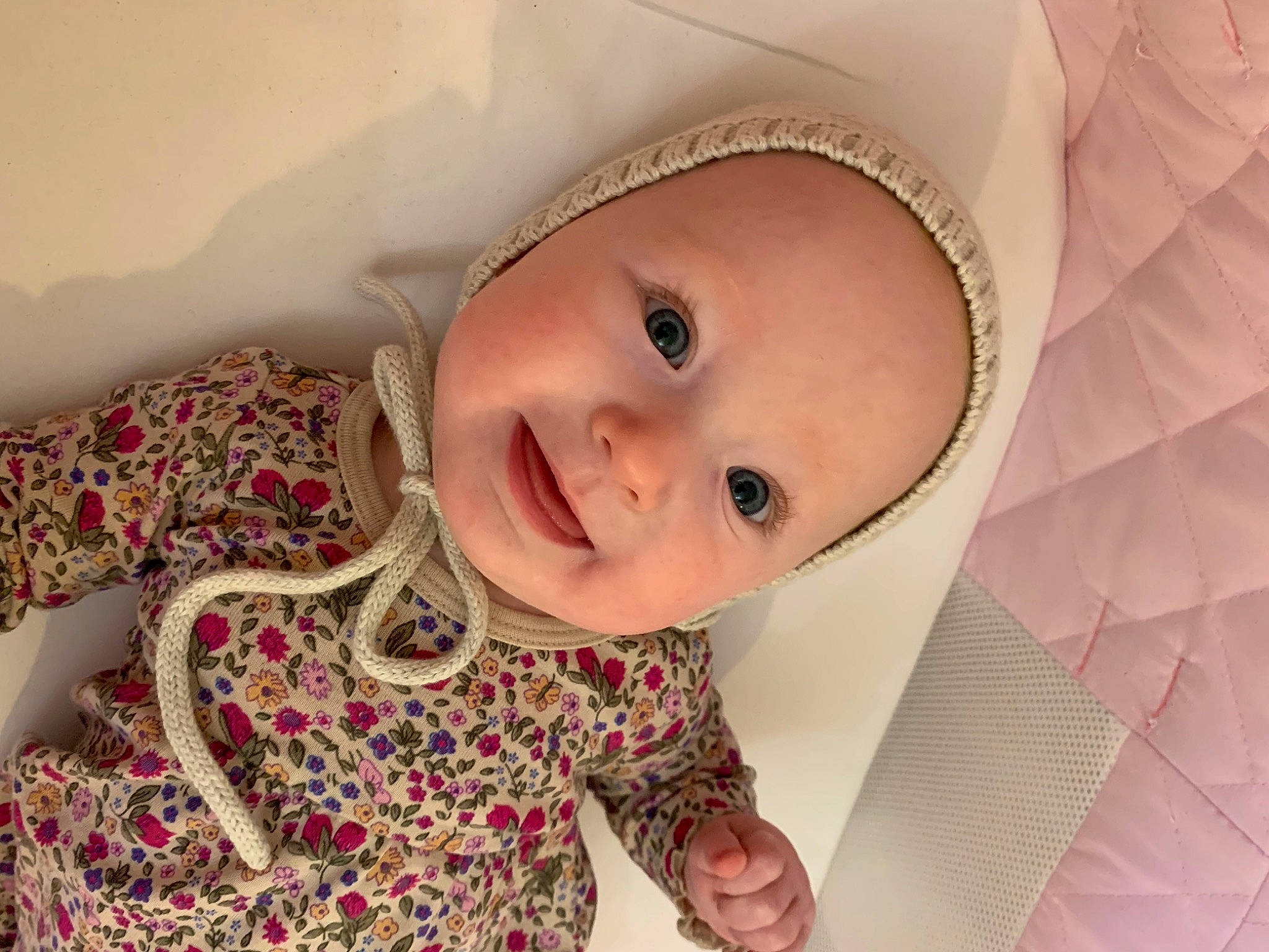 Remi Bea is registered to the contest to win money with this photo: baby, cheek, child, close_up, eye, eyebrow, eyelash, face, forehead, head, headgear, lip, mouth, nose, person, pink, skin, smile, toddler