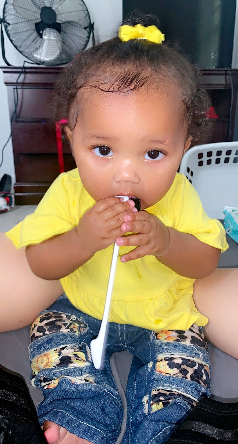 Kelani is registered to the contest to win money with this photo: biting, cheek, child, eyelash, face, finger, fun, gesture, hair, hairstyle, head, iris, mouth, neck, nose, person, skin, snapshot, thumb, toddler