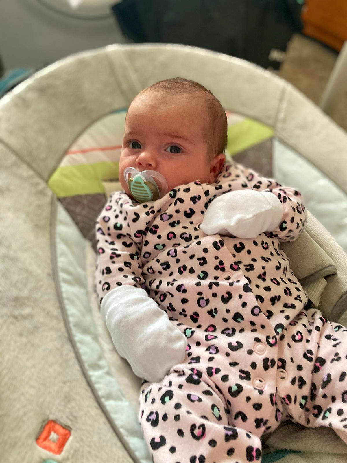 Dulcie is registered to the contest to win money with this photo: baby, baby_products, baby_safety, baby_toddler_clothing, chair, cheek, child, comfort, eye, flooring, fun, head, linens, mouth, pattern, person, product, sitting, skin, sleeve