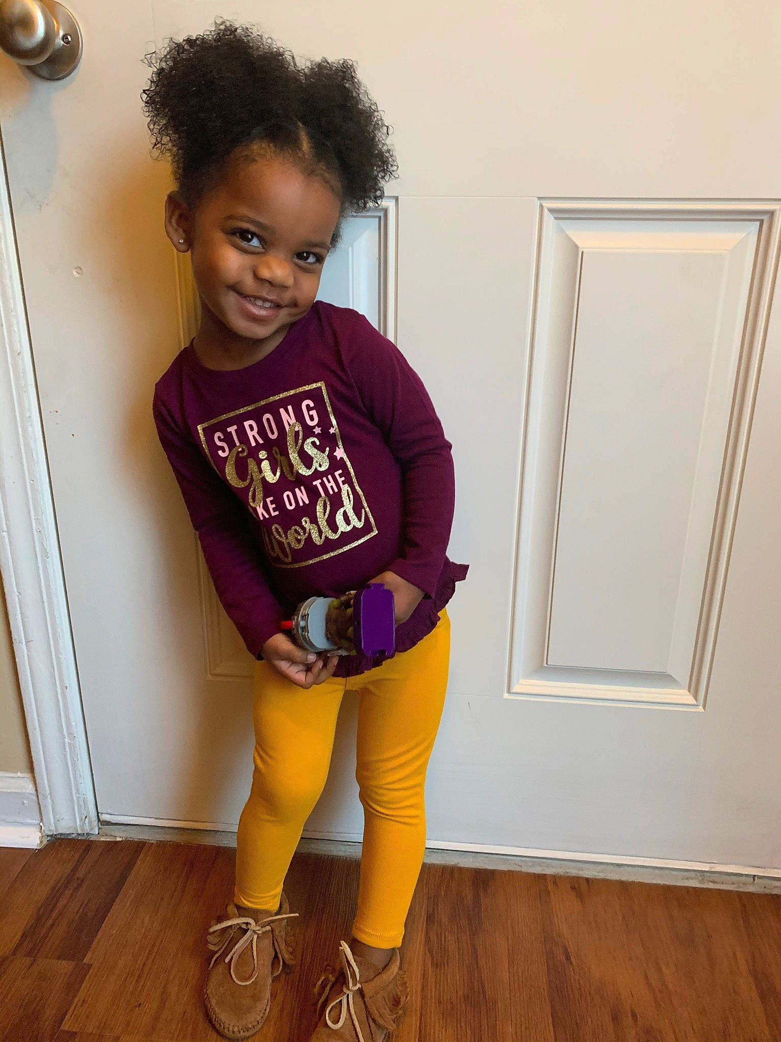 Nova Rae joined the competition — help win amazing prizes! baby_toddler_clothing, fashion_design, flooring, happy, hardwood, joint, joy, knee, leg, magenta, neck, outerwear, person, pink, purple, shoulder, sleeve, smile, t_shirt, toddler