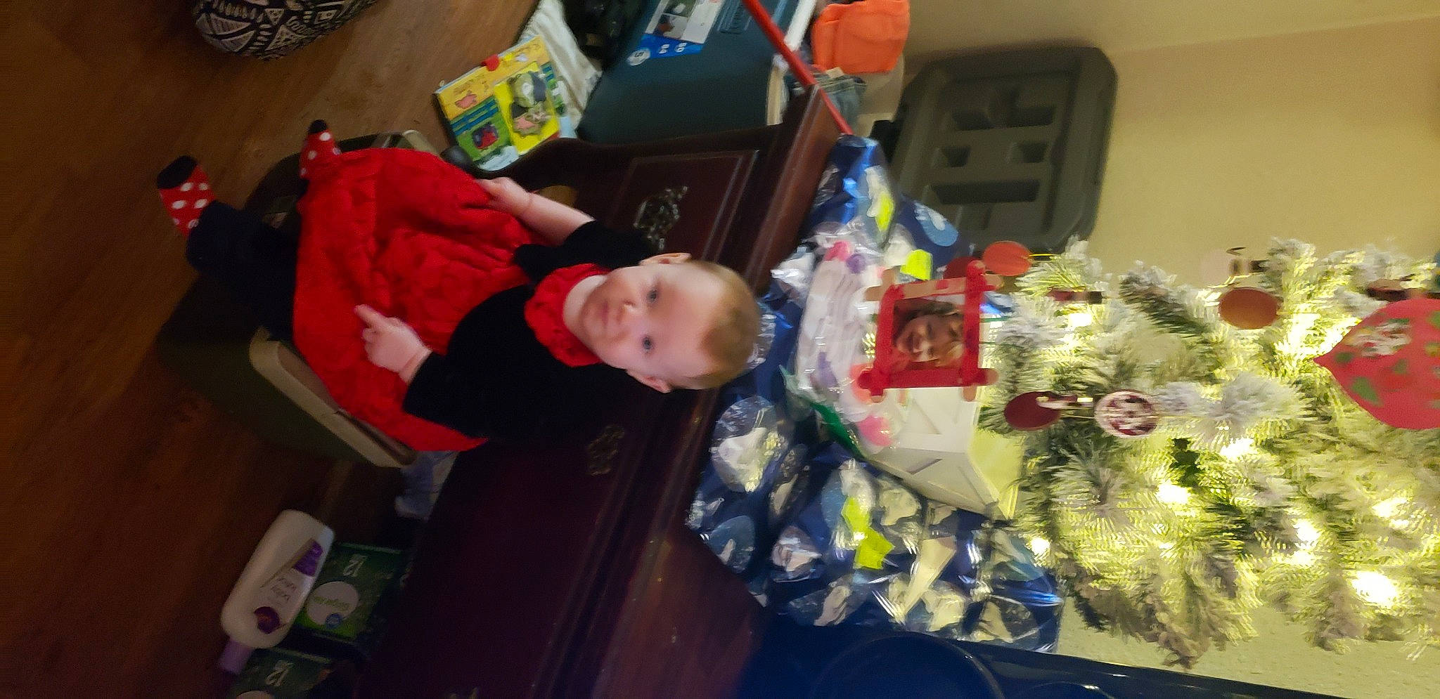 Madison is registered to the contest to win money with this photo: artificial_flower, baby, baby_toddler_clothing, bouquet, cut_flowers, floral_design, floristry, flower_arranging, joy, nose, person, play, toddler