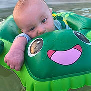 Conan joined the competition — help win amazing prizes! baby, child, inflatable, float, frog, water, pool, cute, adorable, outdoor, summer, mohawk, skin, droplets, green, playful, resting, fun, toy, person