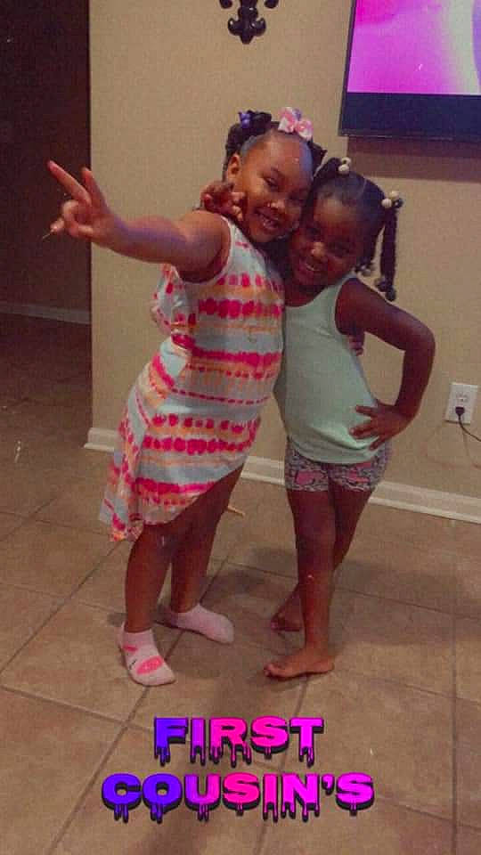 Lyric is registered to the contest to win money with this photo: child, event, face, flooring, fun, gesture, hair, happy, head, human_leg, joint, joy, leg, magenta, person, pink, skin, smile, t_shirt, thigh