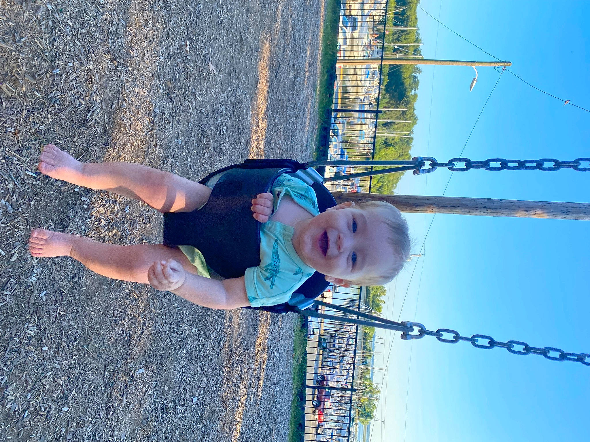 Bentley is registered to the contest to win money with this photo: arm, azure, blue, elbow, electric_blue, electrical_supply, electricity, fun, happy, leisure, people_in_nature, person, public_utility, recreation, shadow, sky, smile, toddler, vacation, water