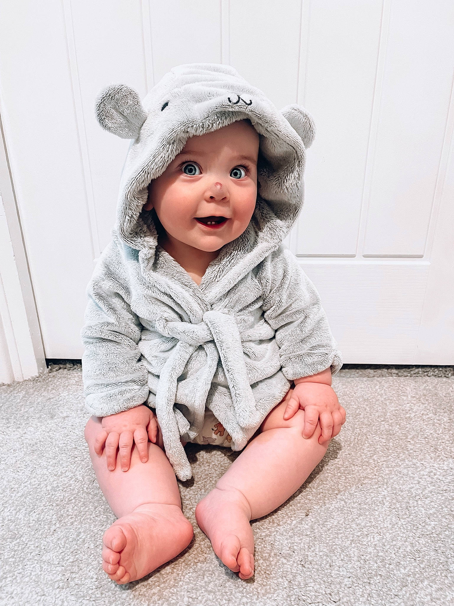 Hali joined the competition — help win amazing prizes! baby, baby_toddler_clothing, cap, collar, eye, face, facial_expression, flash_photography, flooring, gesture, happy, head, headwear, human_leg, leg, lip, outerwear, person, skin, sleeve
