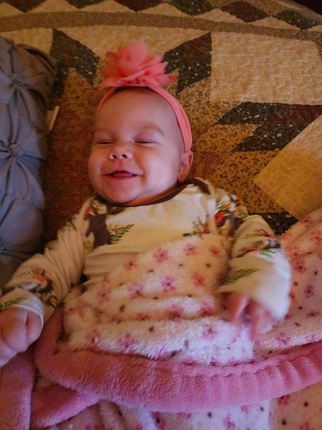 Secret joined the competition — help win amazing prizes! baby, baby_toddler_clothing, cheek, child, comfort, dress, eye, face, happy, head, headgear, human_body, iris, joy, linens, person, pink, skin, sleeve, smile