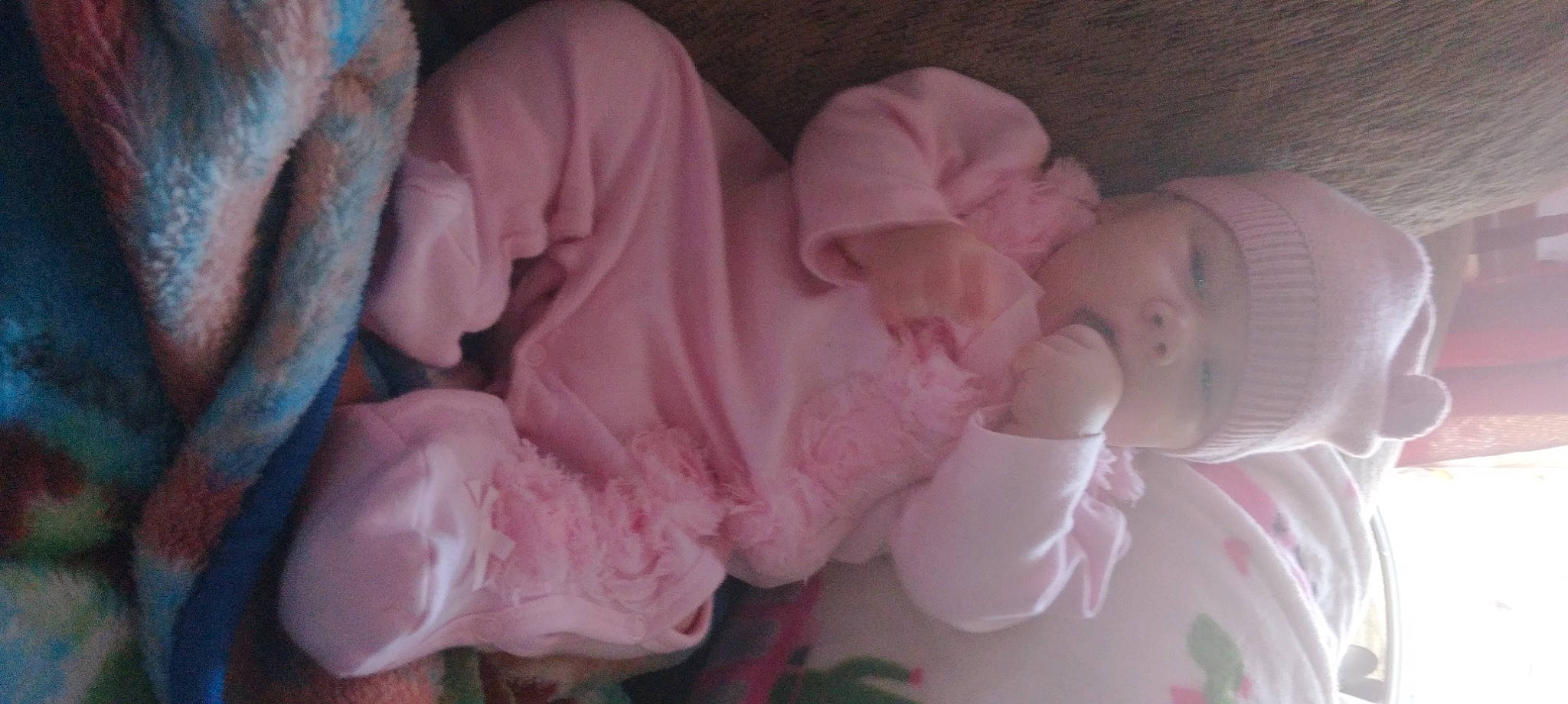 Secret is registered to the contest to win money with this photo: baby, baby_products, baby_toddler_clothing, child, comfort, cut_flowers, event, hair_accessory, linens, magenta, peach, person, petal, pink, plant, room, rose_family, rose_order, sweetness, textile