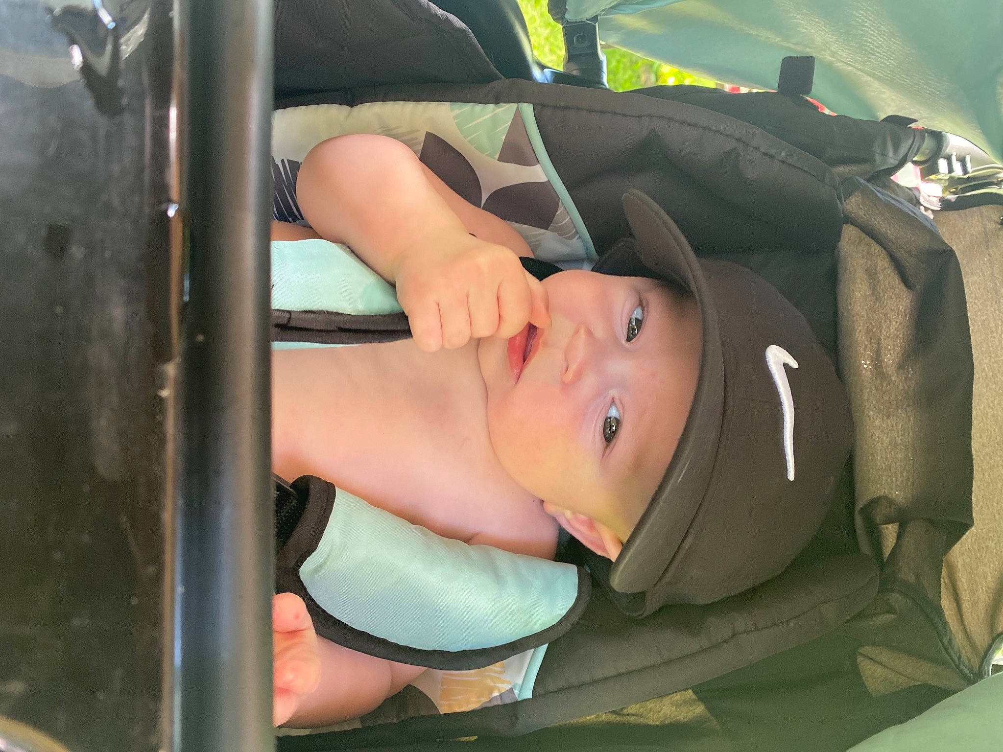 Wyatt is registered to the contest to win money with this photo: auto_part, automotive_design, automotive_exterior, automotive_tire, automotive_wheel_system, bag, black_hair, bumper, car_seat, car_seat_cover, family_car, fun, headwear, hood, human_leg, motor_vehicle, person, personal_luxury_car, thigh, vehicle