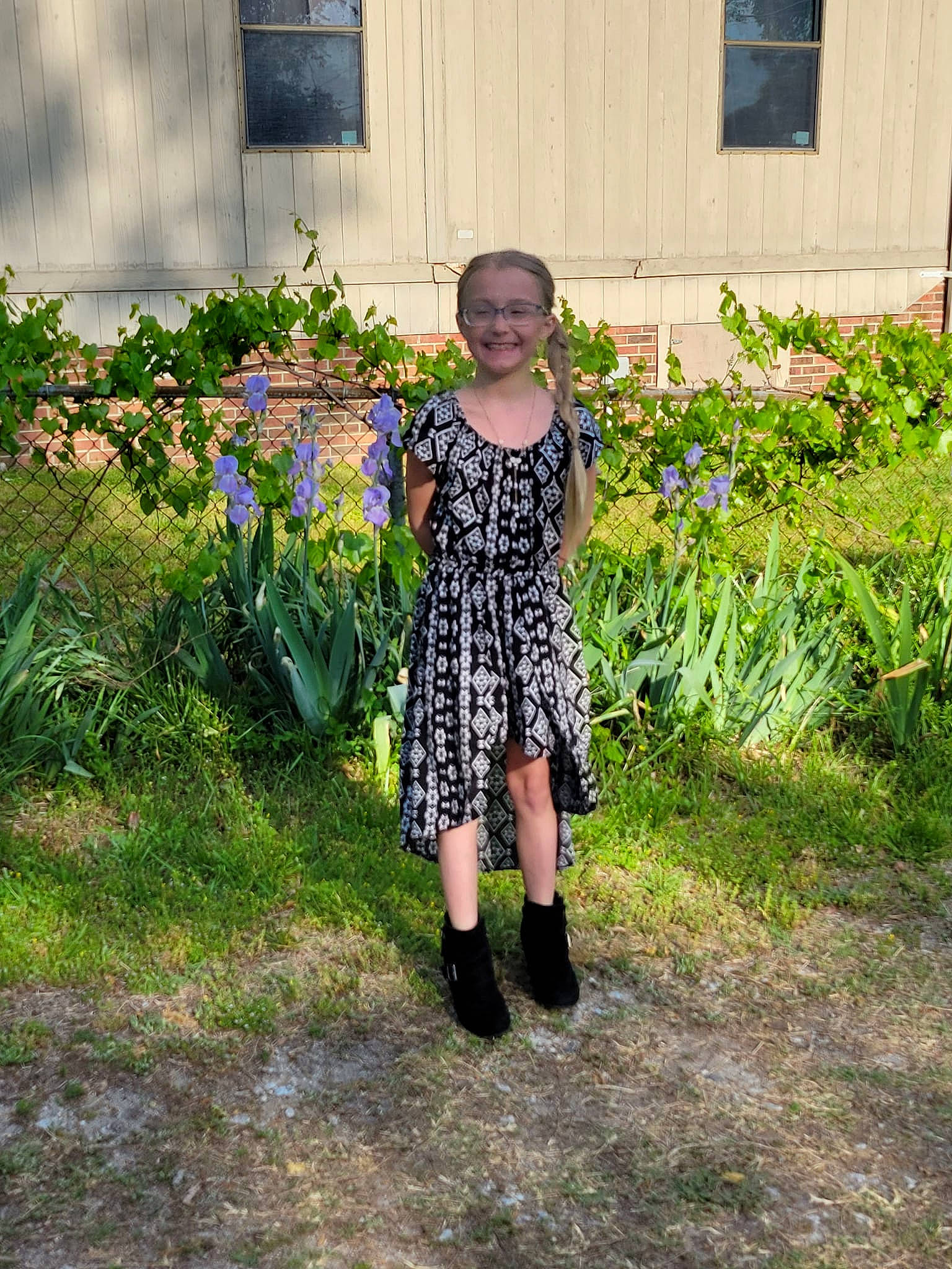 Sierra joined the competition — help win amazing prizes! asphalt, door, electric_blue, flower, grass, grass_family, grassland, house, joy, knee, landscape, lawn, leaf, pattern, people_in_nature, person, plant, shrub, toddler, tree