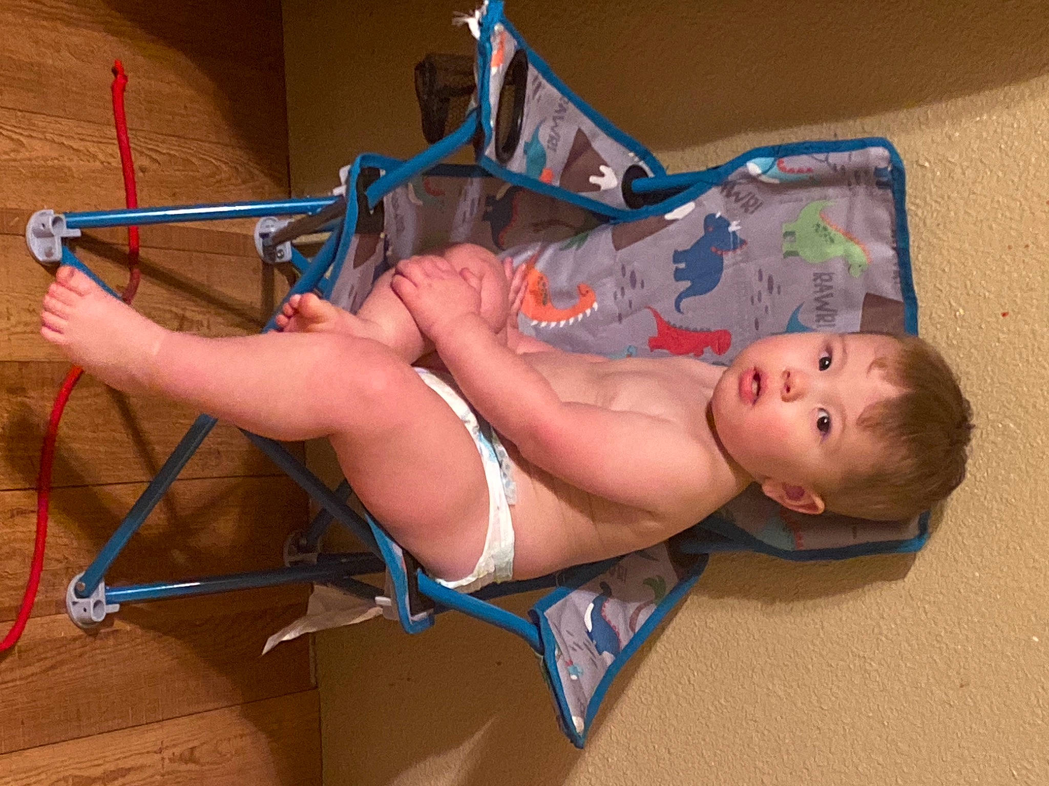 Cannon is registered to the contest to win money with this photo: abdomen, ankle, baby, baby_products, baby_toddler_clothing, chest, child, diaper, foot, person, stomach, swimwear, toddler, toe, trunk, undergarment