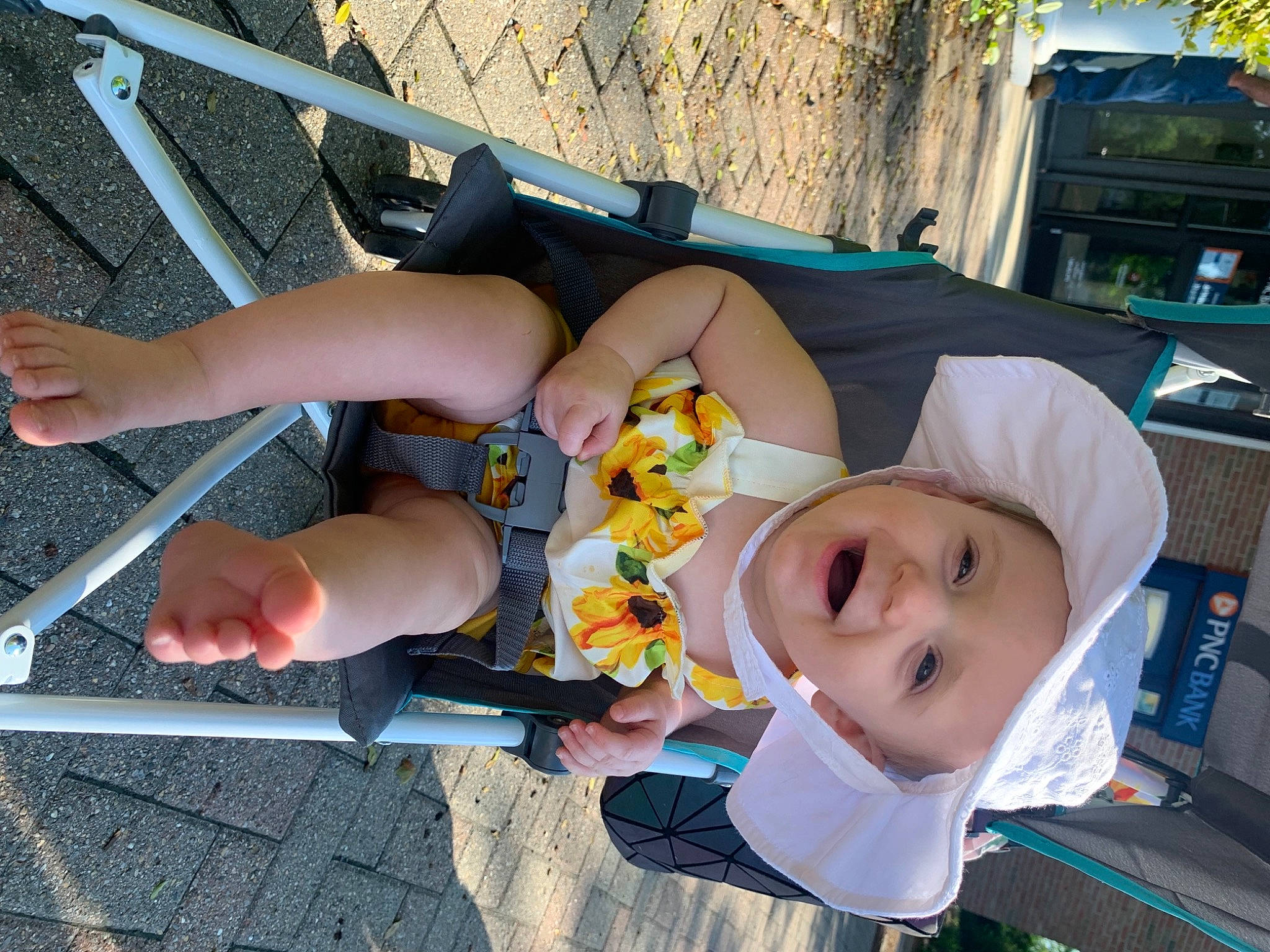 Harper joined the competition — help win amazing prizes! baby, baby_products, child, costume, elbow, foot, fun, hat, headwear, human_leg, knee, leisure, person, recreation, sandal, shorts, smile, sun_hat, thigh, toddler
