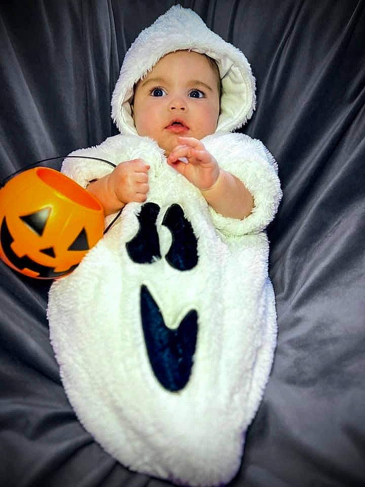 Bella joined the competition — help win amazing prizes! baby, baby_toddler_clothing, ball, calabaza, child, dress, eye, face, happy, headgear, headwear, human_body, person, plant, plush, pumpkin, sitting, sleeve, stuffed_toy, textile