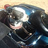 dog, motorcycle, sidecar, harness, outdoor, sunlight, shadow, metal, blue, seat, pet, canine, vehicle, transport, leather, reflection, daylight, travel, curious, adventure