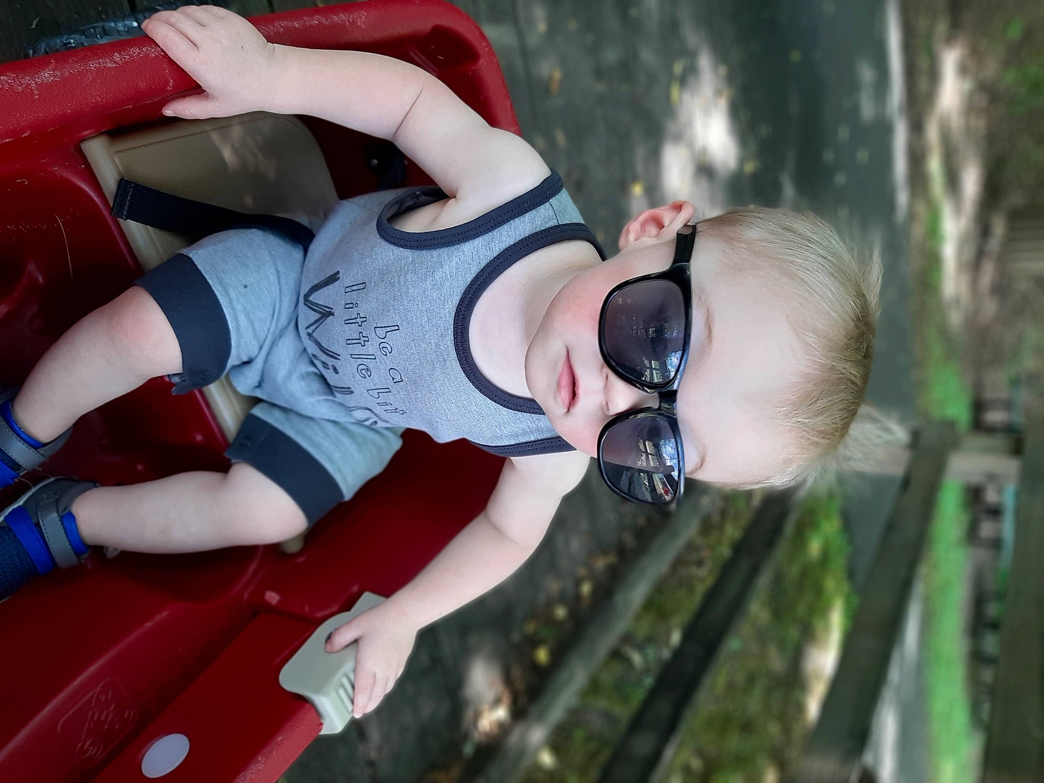 Landry is registered to the contest to win money with this photo: baby, baby_toddler_clothing, carmine, cool, fictional_character, glove, goggles, overall, person, personal_protective_equipment, sneakers, summer, sunglasses, superhero, toddler