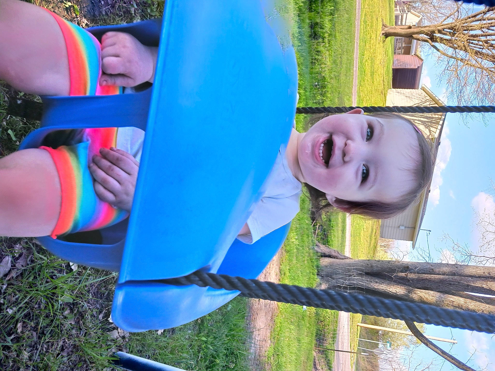 Lillian joined the competition — help win amazing prizes! child, city, electric_blue, fun, grass, happy, joy, leisure, outdoor_play_equipment, people_in_nature, person, plant, public_space, recreation, shorts, sky, smile, swimwear, t_shirt, thigh
