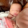 Violet joined the competition — help win amazing prizes! baby, sleeping, blanket, pink, white, hand, face, cozy, soft, couch, leather, infant, rest, closeup, comfort, child, portrait, peaceful, indoor, toddler