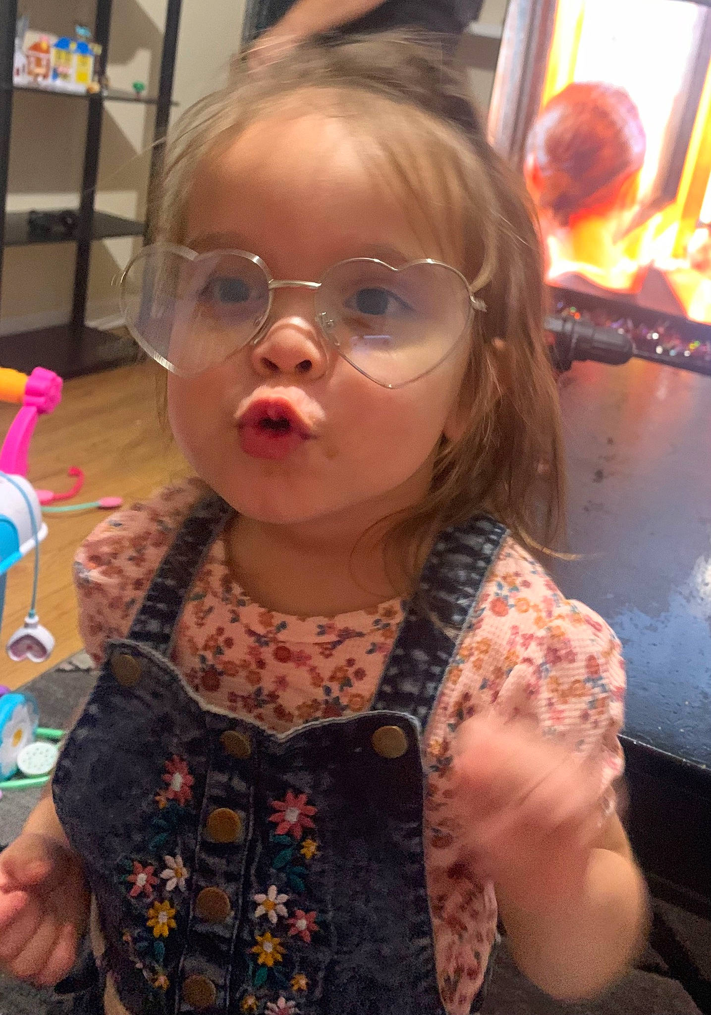 Jayliana is registered to the contest to win money with this photo: cheek, child, cool, ear, eye, eyewear, face, fun, glasses, goggles, head, iris, lip, mouth, nose, person, skin, sunglasses, thumb, toddler