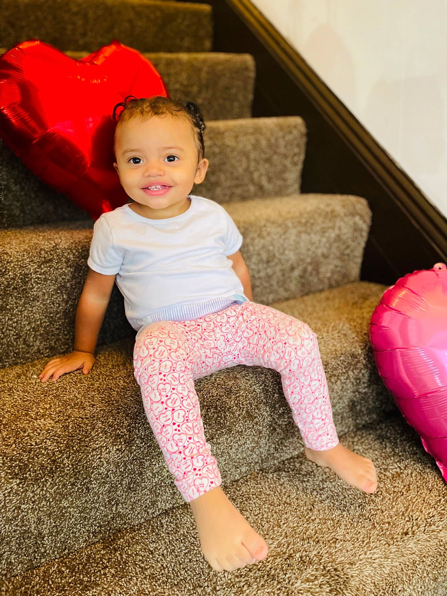 Malia joined the competition — help win amazing prizes! baby_toddler_clothing, barefoot, beauty, cheek, child, comfort, face, floor, flooring, fun, happy, head, human_leg, joy, leisure, magenta, person, pink, sleeve, smile