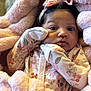 Dakota joined the competition — help win amazing prizes! baby, infant, child, blanket, pink, floral, pajamas, headband, bow, cute, face, portrait, newborn, soft, cozy, clothing, sleepwear, people, closeup, indoors