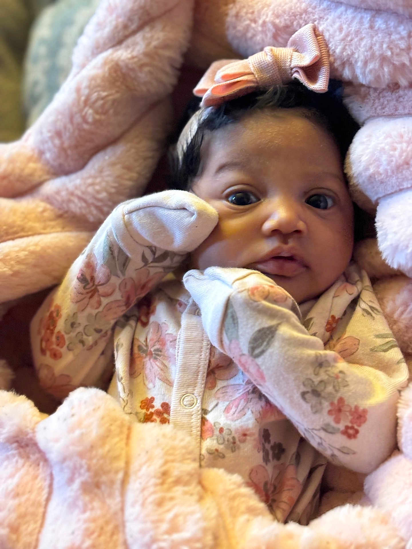 Dakota joined the competition — help win amazing prizes! baby, infant, child, blanket, pink, floral, pajamas, headband, bow, cute, face, portrait, newborn, soft, cozy, clothing, sleepwear, people, closeup, indoors