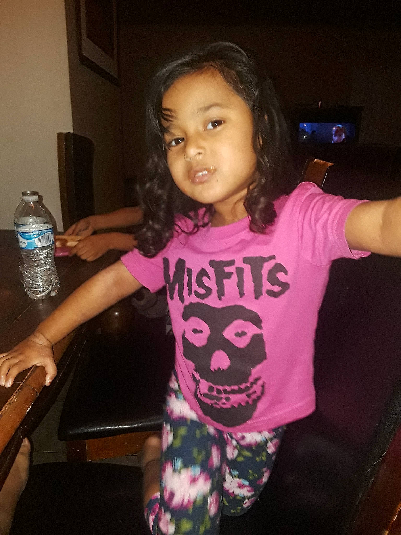 Eden Rose is registered to the contest to win money with this photo: cheek, child, cool, electronic_device, face, finger, fun, head, long_hair, party, person, pink, shoulder, skin, smile, t_shirt, toddler, tooth, top