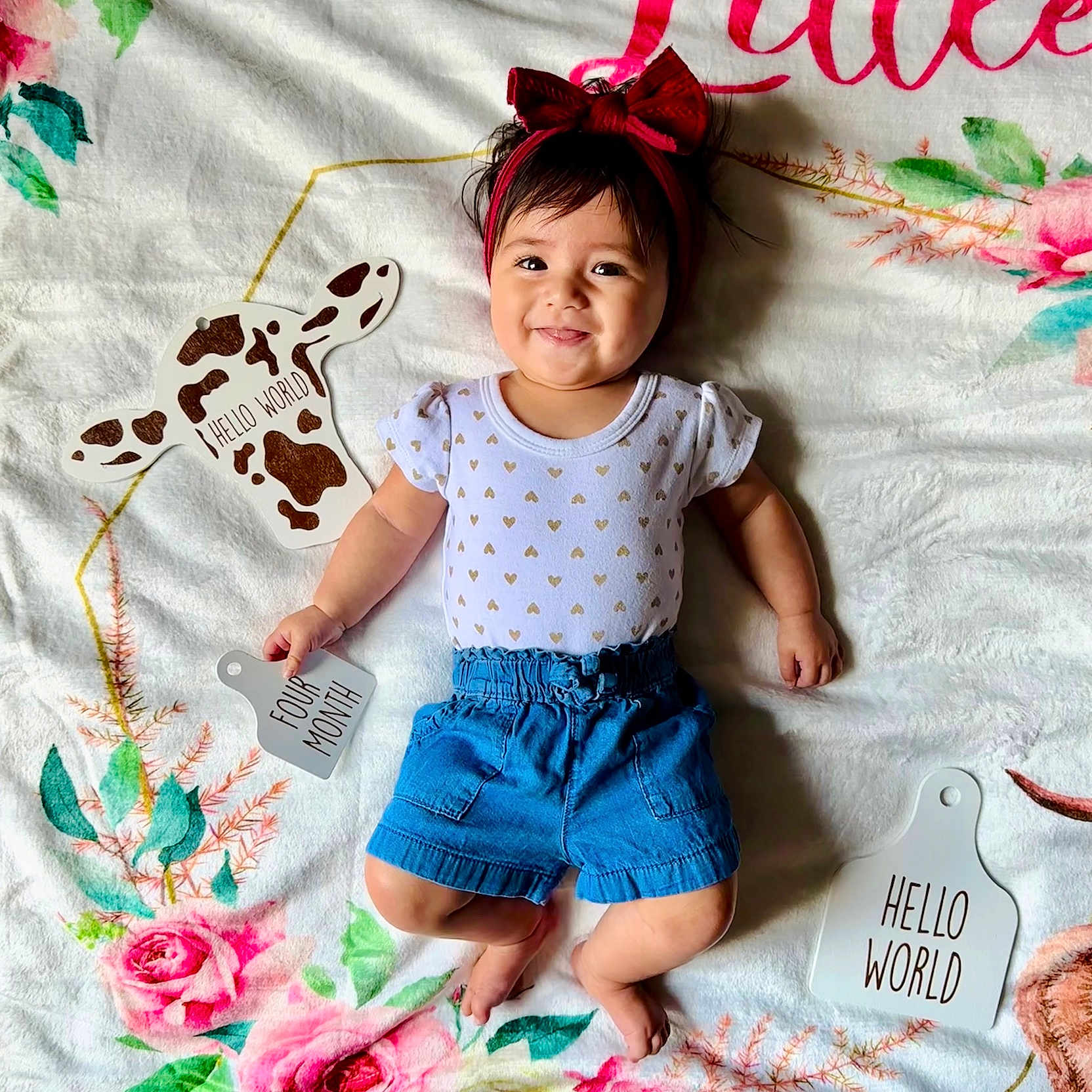 Sadie joined the competition — help win amazing prizes! beachwear, child, clothing, face, female, flower, girl, hair, happy, head, pants, person, photography, plant, portrait, rose, shorts, sitting, sleeve, smile