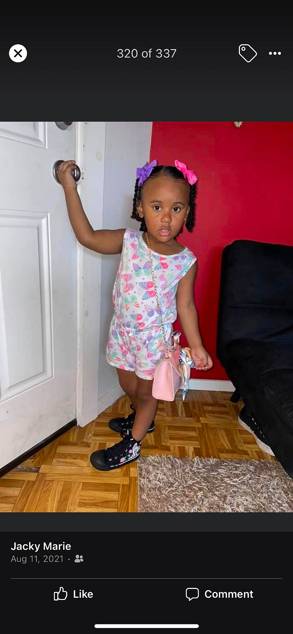 Nakyra is registered to the contest to win money with this photo: baby_toddler_clothing, couch, door, floor, flooring, happy, hardwood, human_body, human_leg, knee, leg, magenta, pattern, person, pink, sandal, sleeve, thigh, toddler, waist