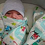 baby, newborn, blanket, hat, infant, wrapped, sleeping, cute, child, face, cozy, winter, holiday, pattern, soft, bed, resting, warm, indoors, portrait