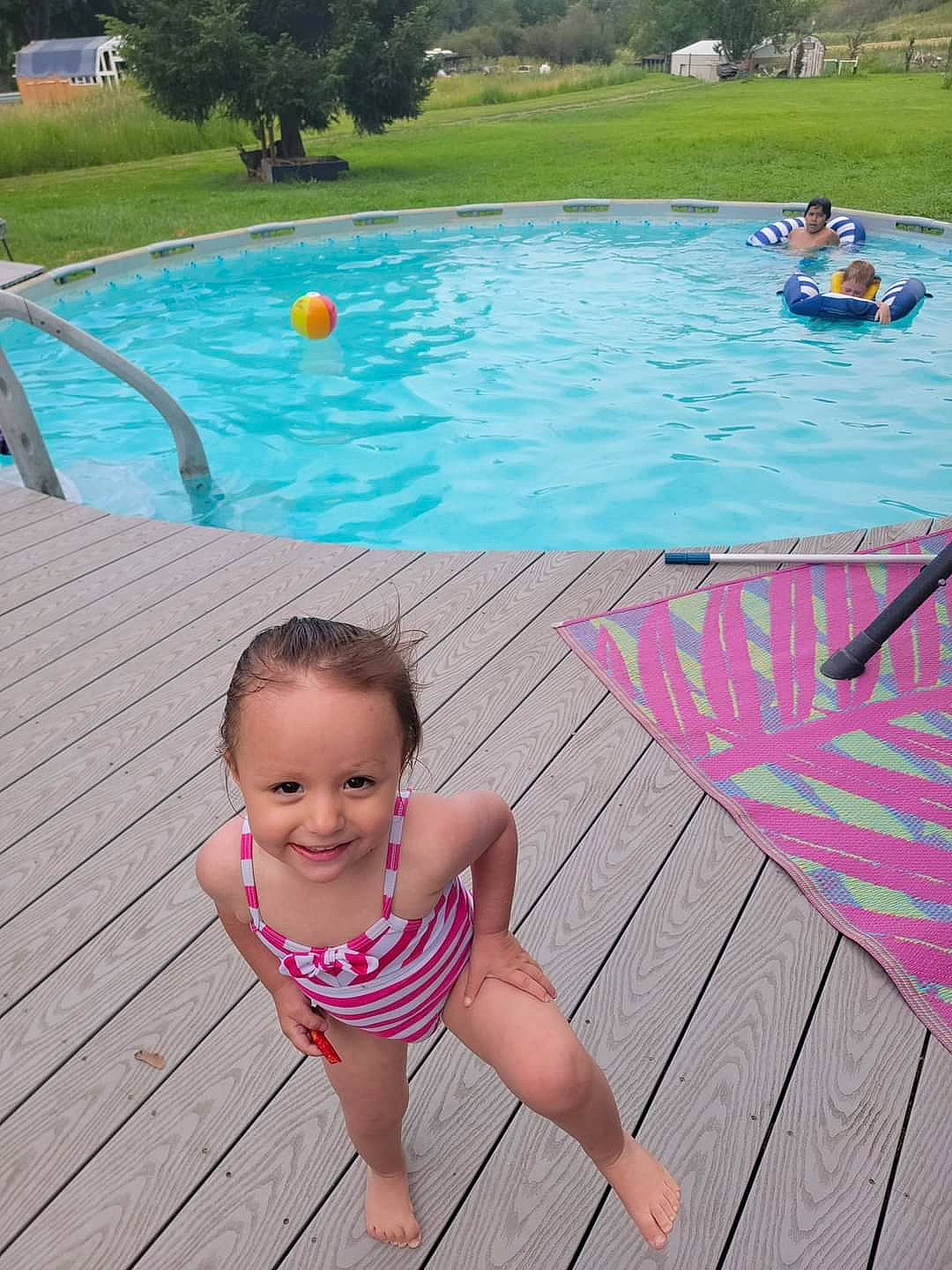 Amirra is registered to the contest to win money with this photo: aqua, baby, baby_toddler_clothing, body_of_water, chair, child, fun, grass, joy, leisure, person, plant, product, recreation, smile, summer, swimming_pool, swimwear, thigh, toddler