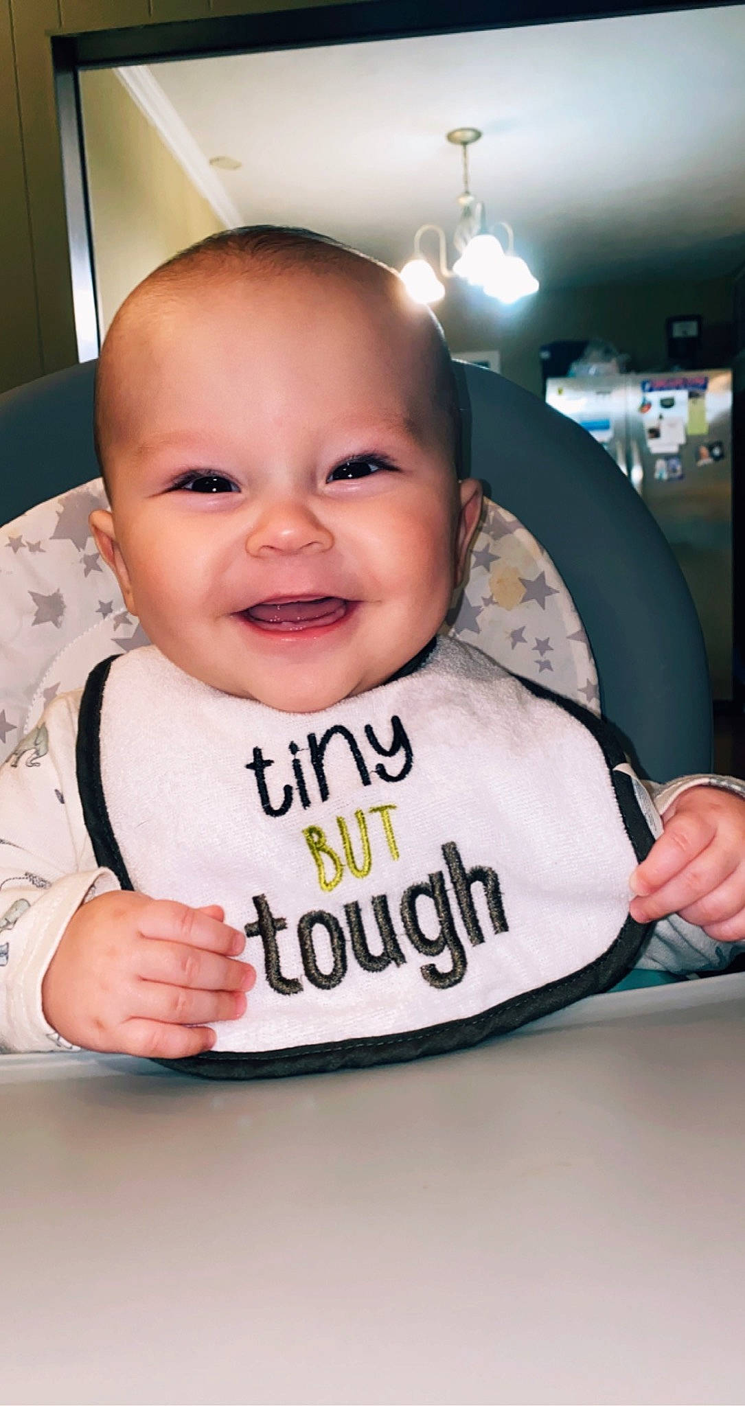 Gatlin joined the competition — help win amazing prizes! baby, baby_products, baby_toddler_clothing, bib, cheek, child, event, eyebrow, eyelash, fun, happy, humour, joy, laugh, nose, person, service, sitting, sleeve, smile