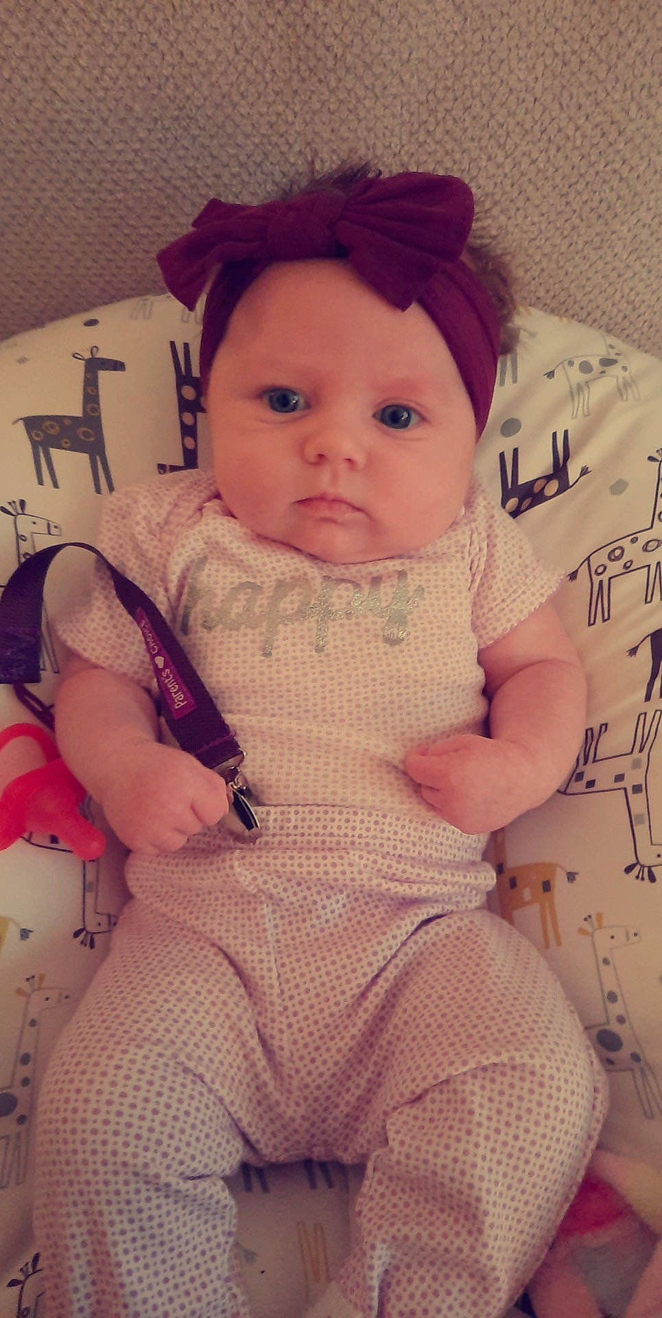 Novaraye is registered to the contest to win money with this photo: baby_toddler_clothing, cheek, comfort, dress, eye, eyelash, face, finger, hand, happy, head, headwear, iris, lip, neck, person, pink, skin, sleeve, standing