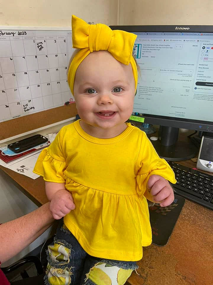 Hazel is registered to the contest to win money with this photo: baby, baby_toddler_clothing, child, computer, computer_keyboard, computer_monitor, desk, fun, happy, input_device, joy, output_device, peripheral, person, personal_computer, shorts, sleeve, smile, space_bar, t_shirt