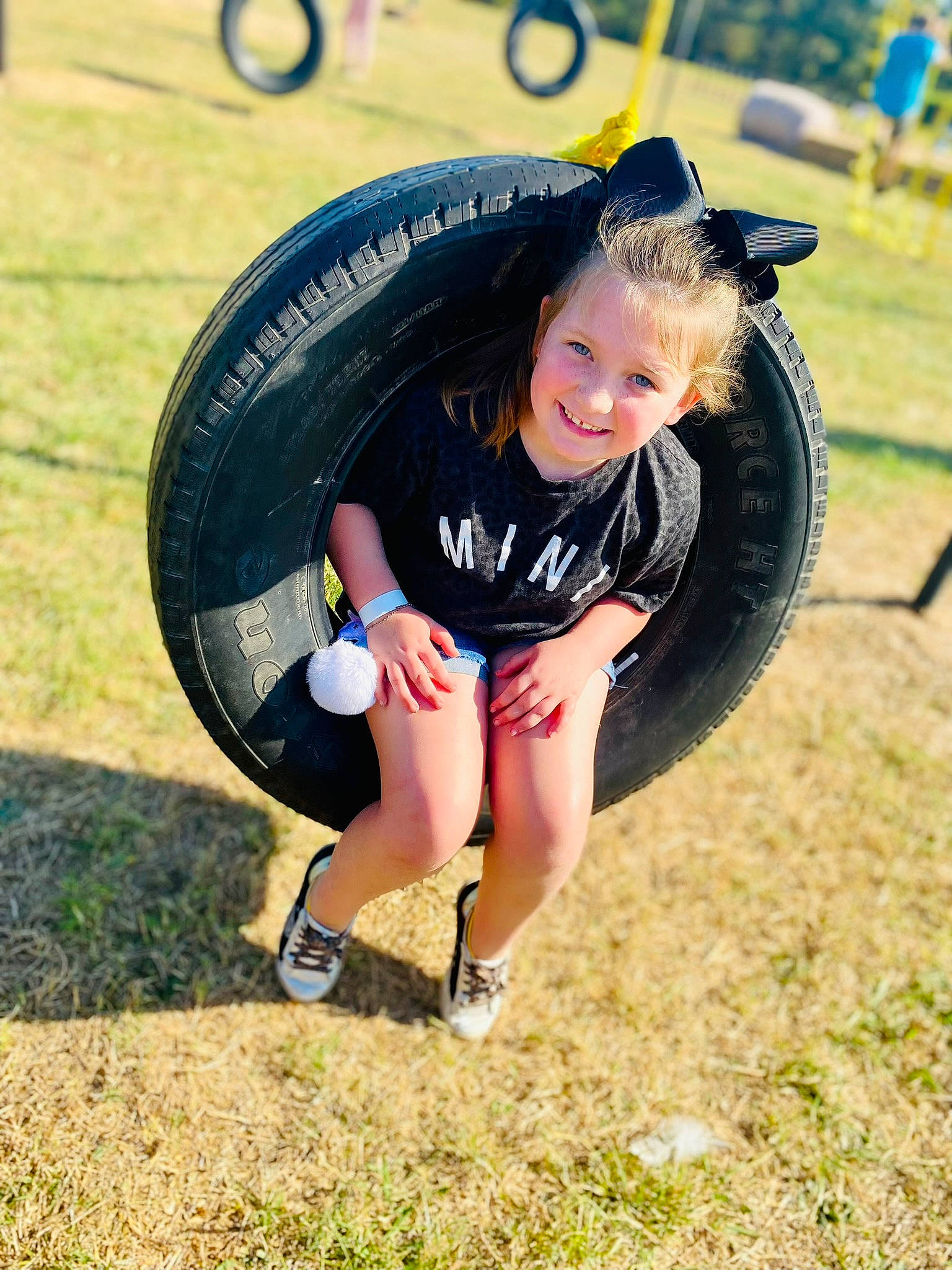 Charlee joined the competition — help win amazing prizes! auto_part, automotive_tire, automotive_wheel_system, bicycle_tire, competition_event, electric_blue, fun, grass, happy, human_leg, joy, knee, leisure, person, physical_fitness, recreation, rim, sportswear, t_shirt, thigh